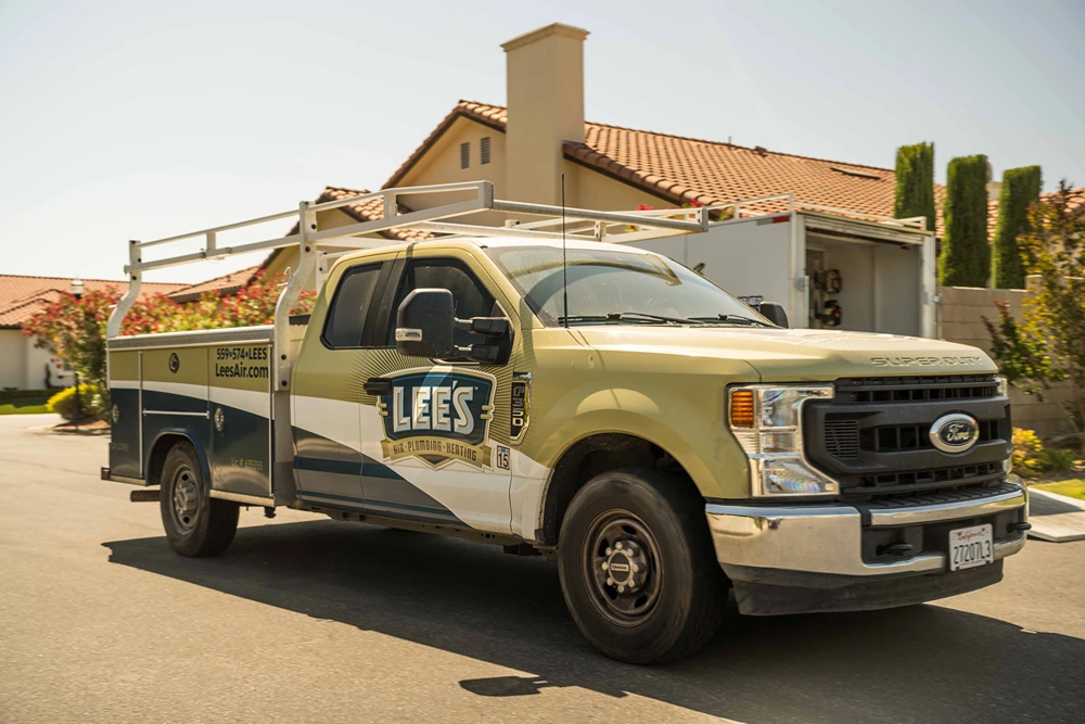 Lee's service truck arriving at a job