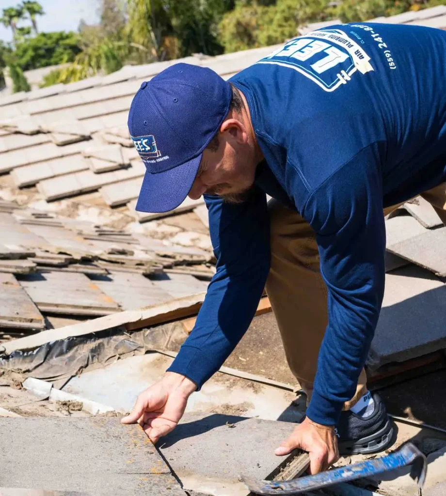 Lee's roofing crew removing an old roof