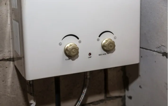 A close up of a tankless hot water heater, ideal for an area with less space